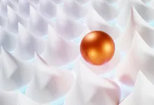 Una sfera arancione isolata al centro di molte forme bianche identiche
