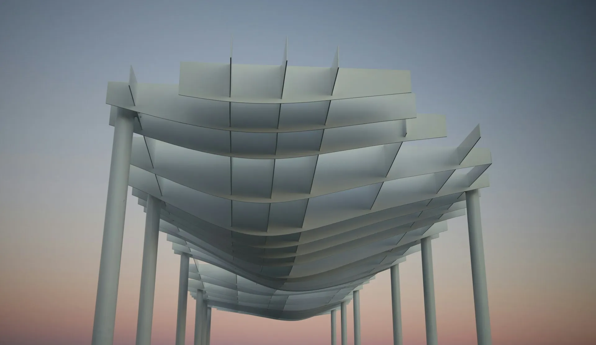 Una copertura architettonica bianca e ondulata, sorretta da una fitta serie di sottili colonne, contro un cielo al tramonto